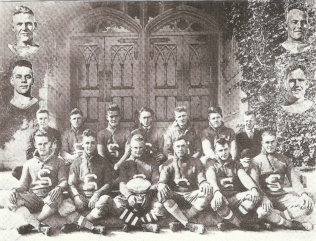 Most of the essential players posed for photo on steps leading to a campus building. Coach Price is rear, left. Sprott is third from right in front row.