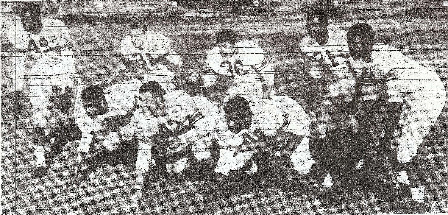 Edwards (right) and San Diego High teammates dominated on defense as well as offense.