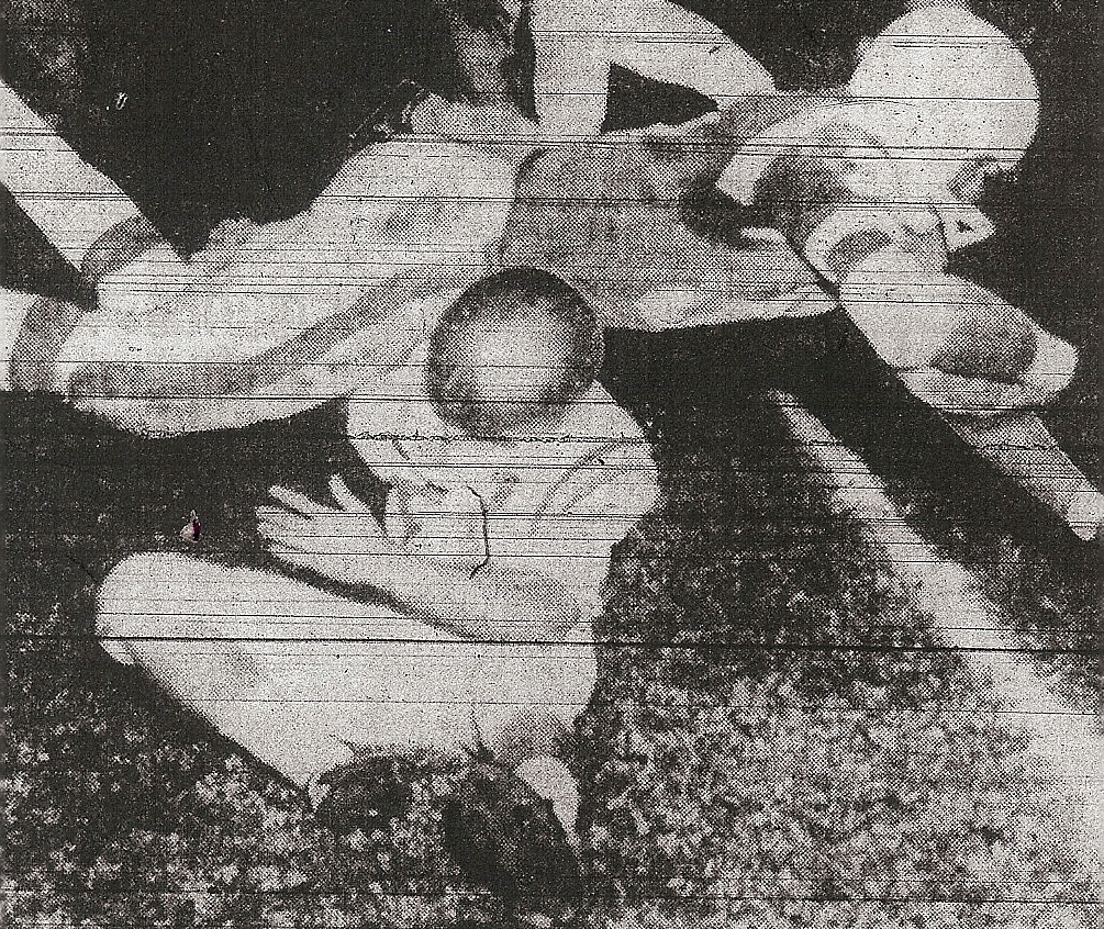 St. Augustine's Jimmy Antl goes low to stop Lincoln's Marvin Lowery as Eastern League team battled to 6-6 standoff.