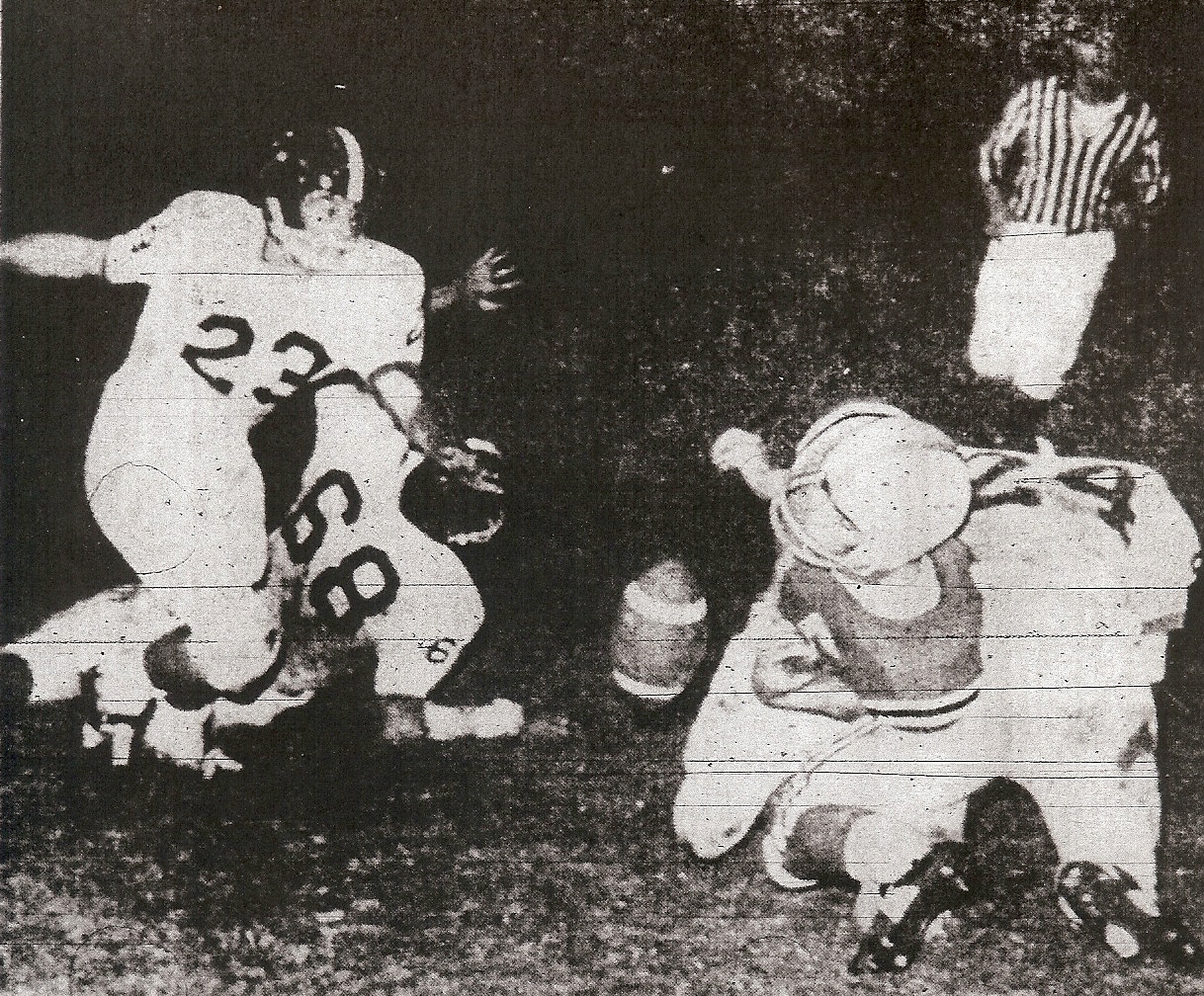 Hoover's Bobby Smith (24) jars Escondido's Bob Blunt into rare fumble, but Cougars knocked out Hoover, 28-26 in playoffs.