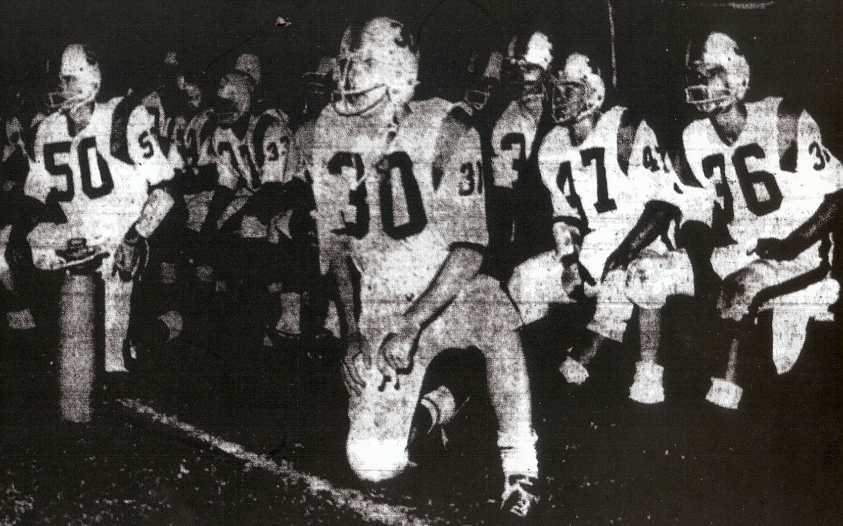 Ken Henderson (36) and teammates are rapt observers as Clairemont nears upset win over Helix.