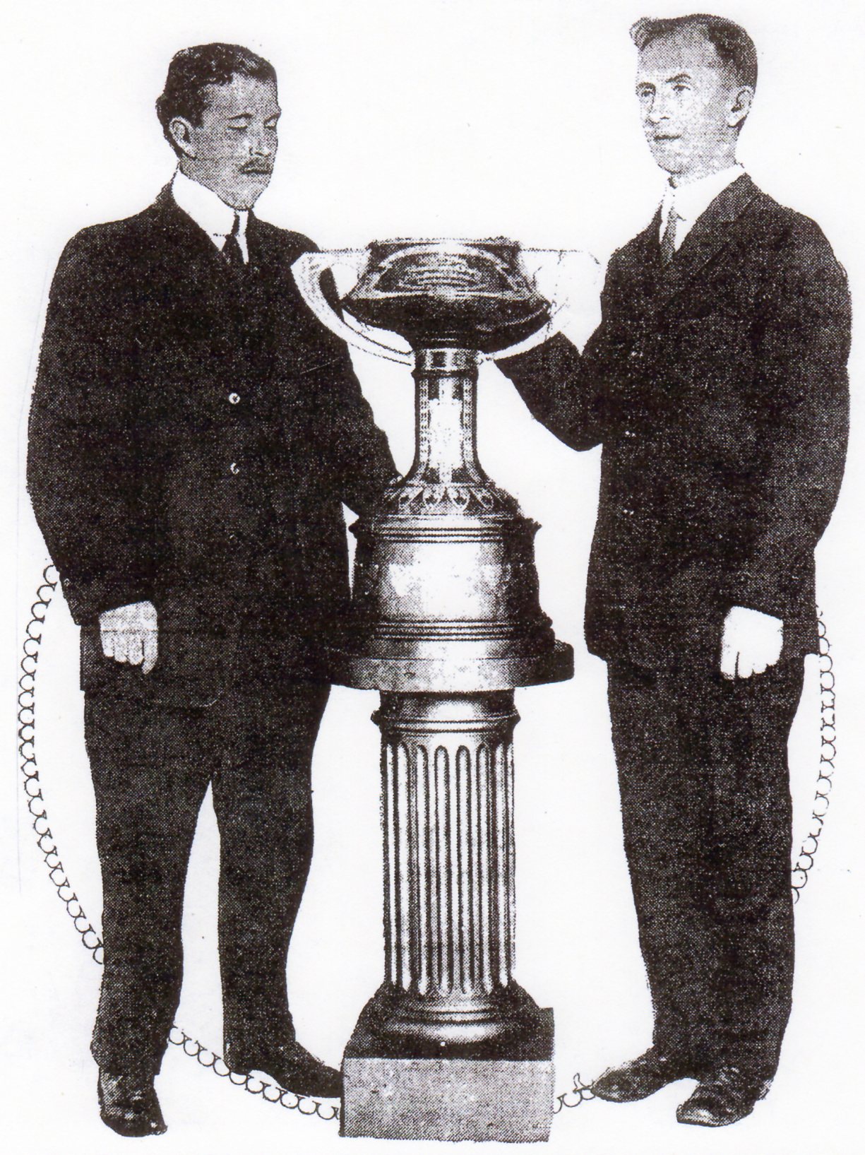 Van Patten (right) and Earnest Oliver of Los Angeles High, with perpetual trophy, were pivotal figures in formation of CIF kin 1913.