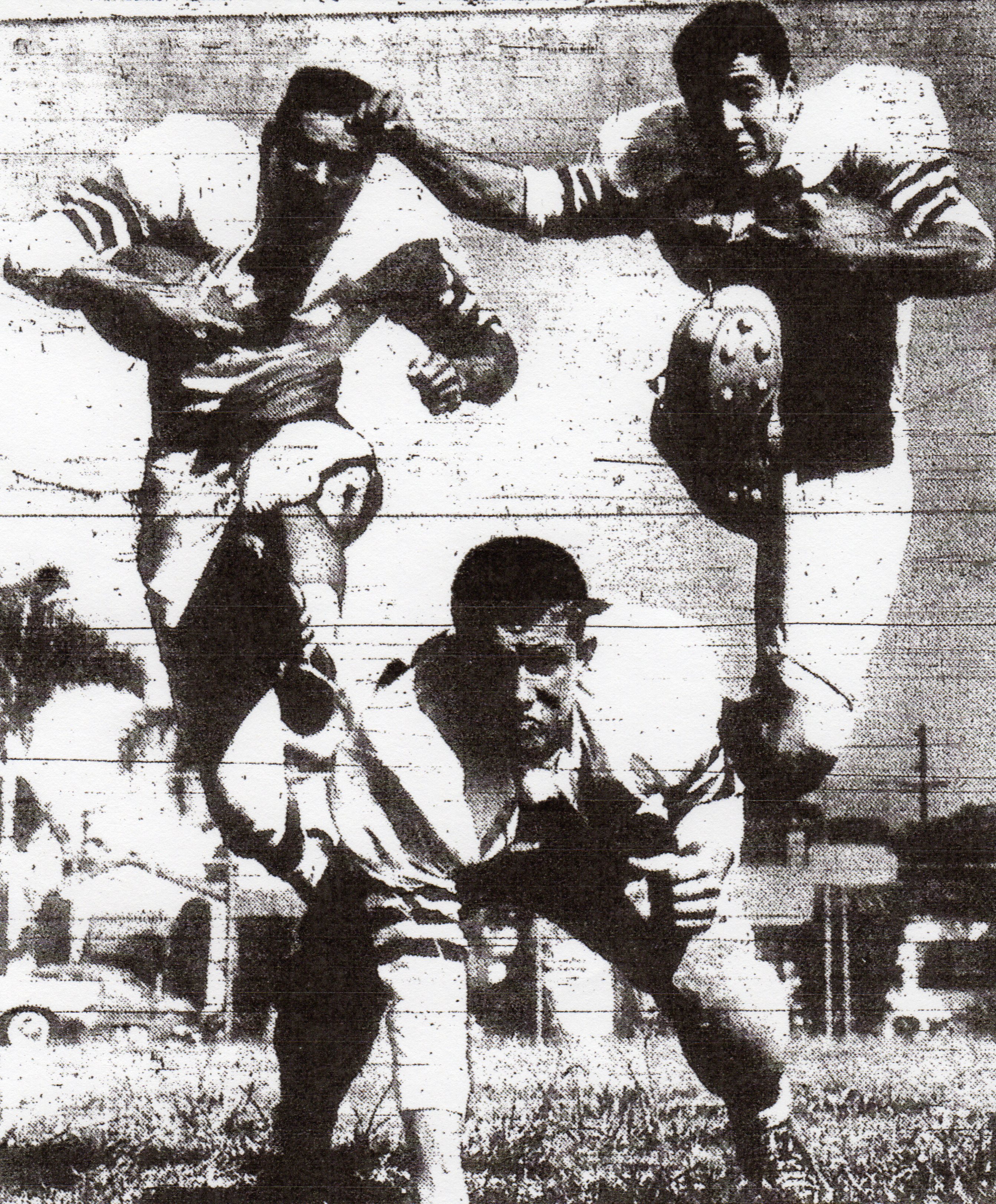 Hurdling toward a 7-2 record were St. Aiugustine's Vic Machanis (left) and Al Roman, with guard Joe Mullen providing security.